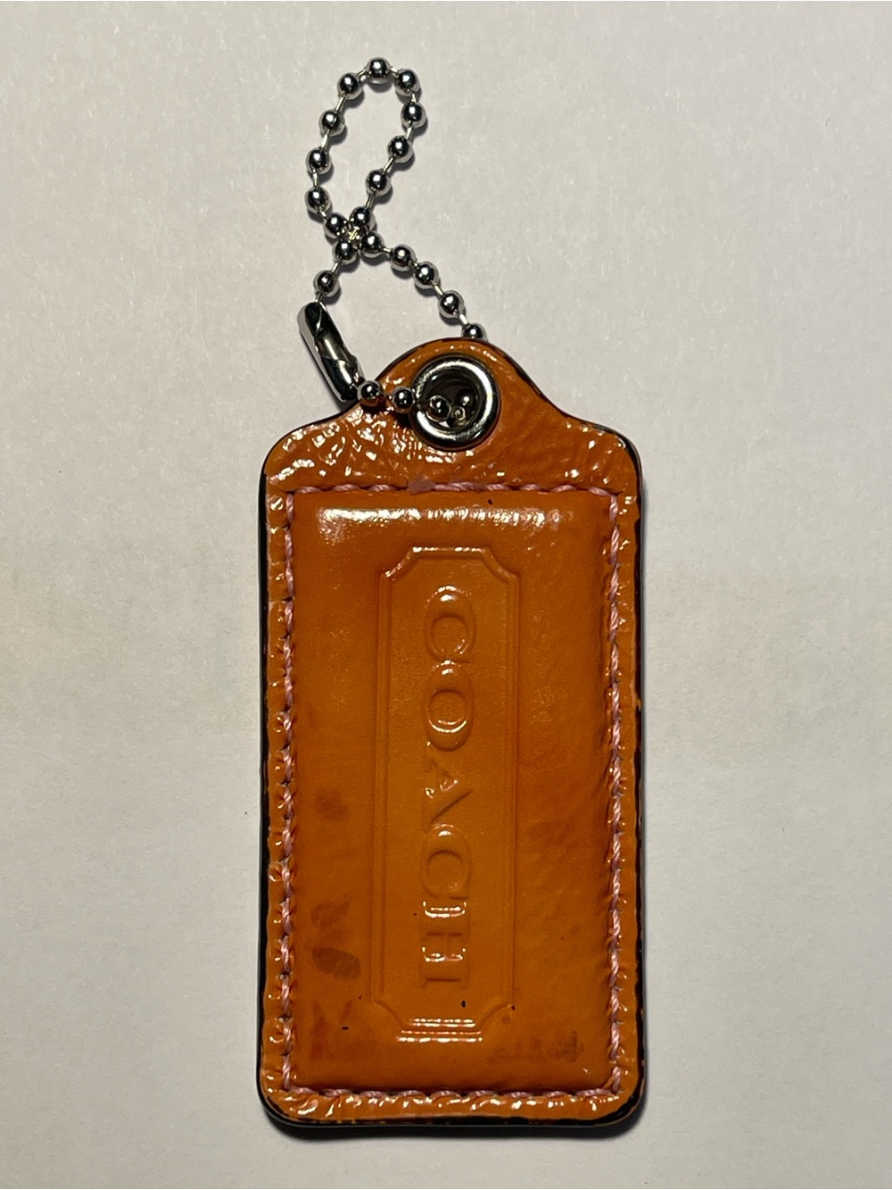 Coach Orange Patent Leather Hang Tag with Silver Ball Chain
